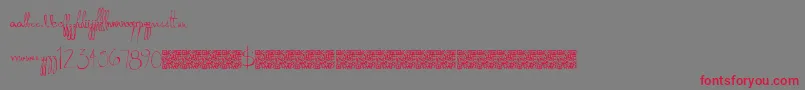 フォントDonkeypunch – 赤い文字の灰色の背景