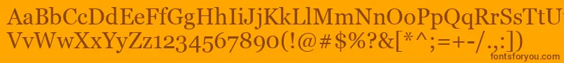 MsReferenceSerif-fontti – ruskeat fontit oranssilla taustalla