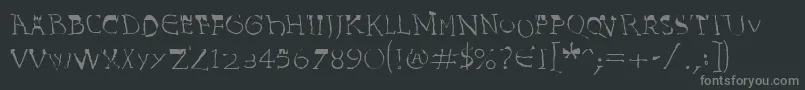 フォントInvasionLtHarold – 黒い背景に灰色の文字