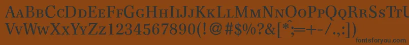 Więcej informacji o czcionce F820RomanSmcRegular Czcionka F820RomanSmcRegular – czarne czcionki na brązowym tle
