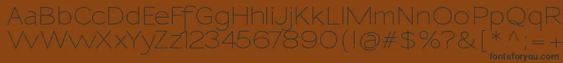 SansumiRegular Font – Black Fonts on Brown Background