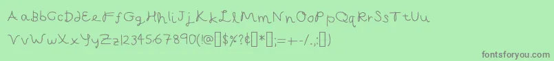 Czcionka CapellaCalligraphy – szare czcionki na zielonym tle