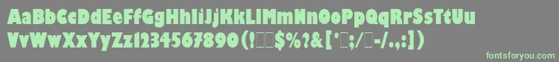 フォントGillKayoCondensedLetPlain.1.0 – 灰色の背景に緑のフォント