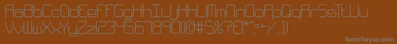 Quarthin-Schriftart – Graue Schriften auf braunem Hintergrund