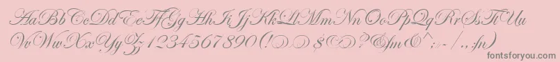 EdwardianScrAltItcTt-Schriftart – Graue Schriften auf rosa Hintergrund