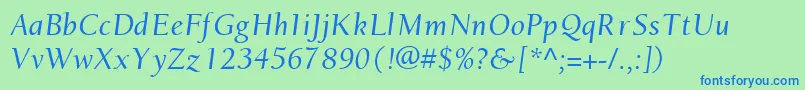 EuronewstyleItalic-Schriftart – Blaue Schriften auf grünem Hintergrund