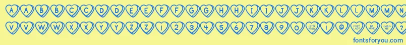 フォントSweetHeartsBv – 青い文字が黄色の背景にあります。