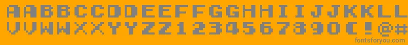 GamegirlClassic-fontti – harmaat kirjasimet oranssilla taustalla