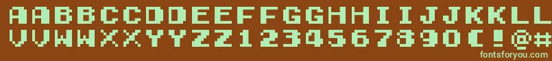 フォントGamegirlClassic – 緑色の文字が茶色の背景にあります。