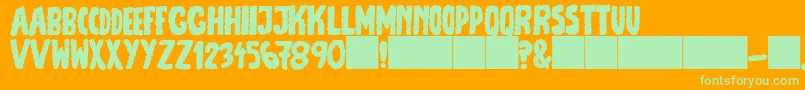 JmhEscamasFill Font – Green Fonts on Orange Background