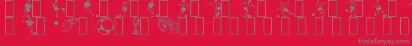 SoccerDance-Schriftart – Graue Schriften auf rotem Hintergrund