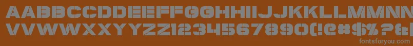 Coulson-fontti – harmaat kirjasimet ruskealla taustalla