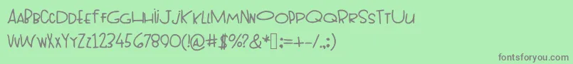 フォントTopheavy – 緑の背景に灰色の文字