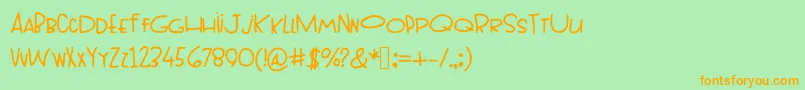フォントTopheavy – オレンジの文字が緑の背景にあります。