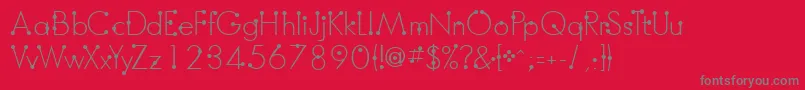 BoumboumFreeVersion-Schriftart – Graue Schriften auf rotem Hintergrund