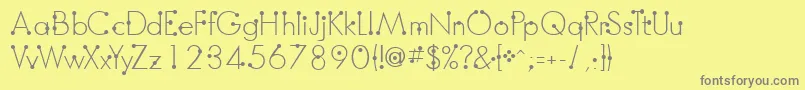 BoumboumFreeVersion-fontti – harmaat kirjasimet keltaisella taustalla