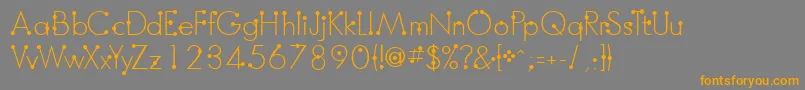フォントBoumboumFreeVersion – オレンジの文字は灰色の背景にあります。