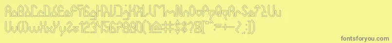HouseBuilderHollow-Schriftart – Graue Schriften auf gelbem Hintergrund