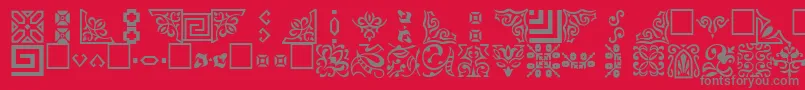 フォントOrnamenttt – 赤い背景に灰色の文字