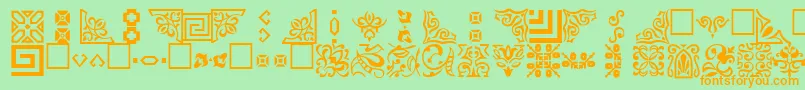 Ornamenttt-Schriftart – Orangefarbene Schriften auf grünem Hintergrund