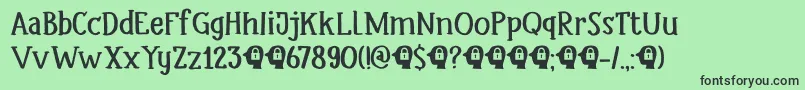 DkHeadlock-fontti – mustat fontit vihreällä taustalla