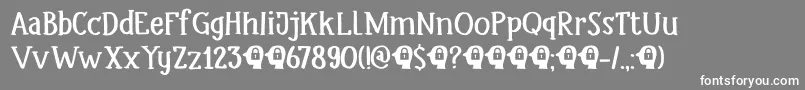 フォントDkHeadlock – 灰色の背景に白い文字