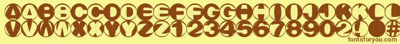 Rainnm-fontti – ruskeat fontit keltaisella taustalla