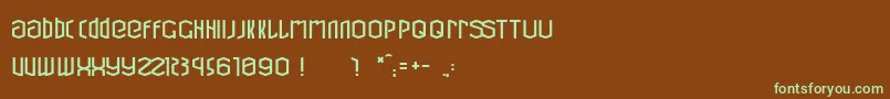 フォントCubicRefit – 緑色の文字が茶色の背景にあります。
