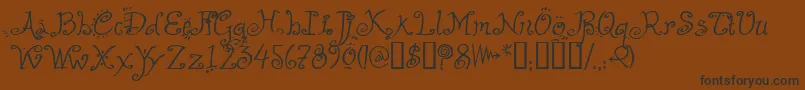 HelzapoppinTM Font – Black Fonts on Brown Background