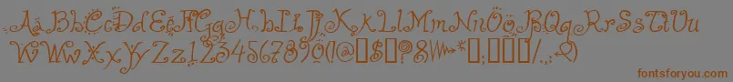 HelzapoppinTM Font – Brown Fonts on Gray Background