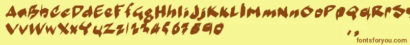 フォントMarkermoeIi – 茶色の文字が黄色の背景にあります。