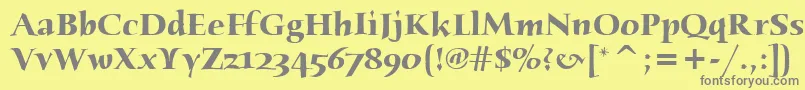 フォントHumanaSerifItcBold – 黄色の背景に灰色の文字