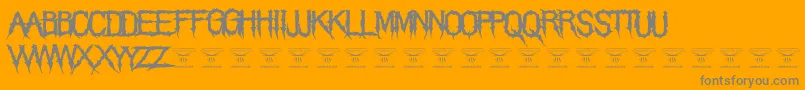 Lisätietoja ThegrimraidersRegular-fontista ThegrimraidersRegular-fontti – harmaat kirjasimet oranssilla taustalla