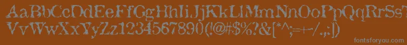 JackTheHipper-fontti – harmaat kirjasimet ruskealla taustalla