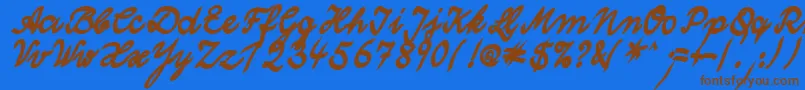 フォントWolgastTwoBold – 茶色の文字が青い背景にあります。
