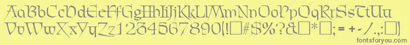 フォントChevalierRegular – 黄色の背景に灰色の文字