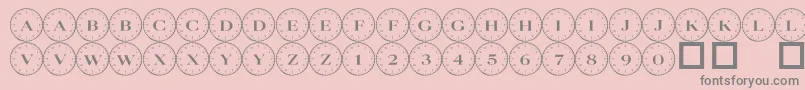 101compass Font – Gray Fonts on Pink Background