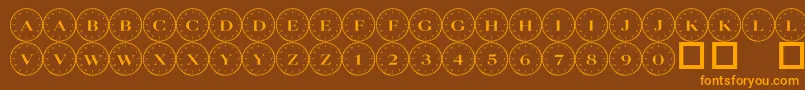 101compass-fontti – oranssit fontit ruskealla taustalla