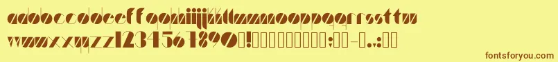 フォントArtistica – 茶色の文字が黄色の背景にあります。