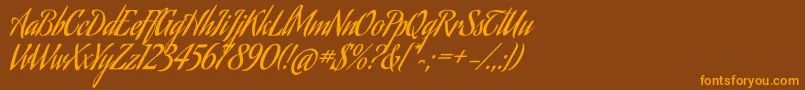 AguafinaScriptRegular Font – Orange Fonts on Brown Background