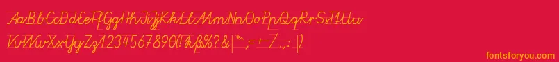 フォントGruenewaldVa1k – 赤い背景にオレンジの文字