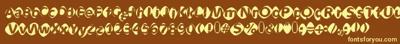 Aidaoopsxtra Font – Yellow Fonts on Brown Background