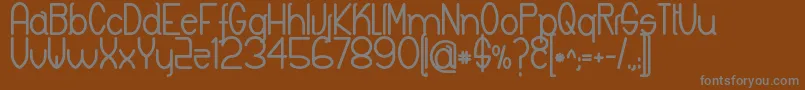 フォントKeylaBold – 茶色の背景に灰色の文字