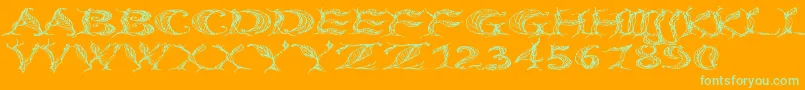Czcionka CftreeoflifeWide – zielone czcionki na pomarańczowym tle