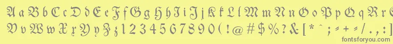 Neuetheuerdankfrakturgesperrtunz1a-Schriftart – Graue Schriften auf gelbem Hintergrund
