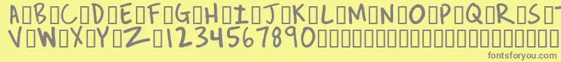 フォントReverendJosh – 黄色の背景に灰色の文字
