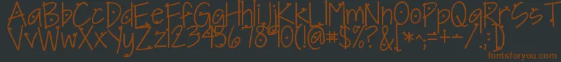 Kgineedaheartfont-fontti – ruskeat fontit mustalla taustalla