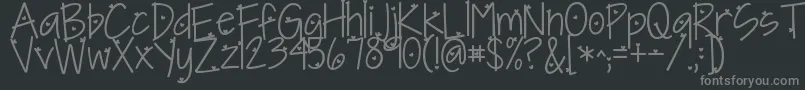 Kgineedaheartfont-fontti – harmaat kirjasimet mustalla taustalla