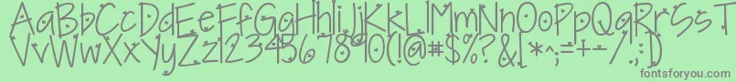 フォントKgineedaheartfont – 緑の背景に灰色の文字