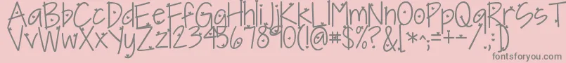 フォントKgineedaheartfont – ピンクの背景に灰色の文字